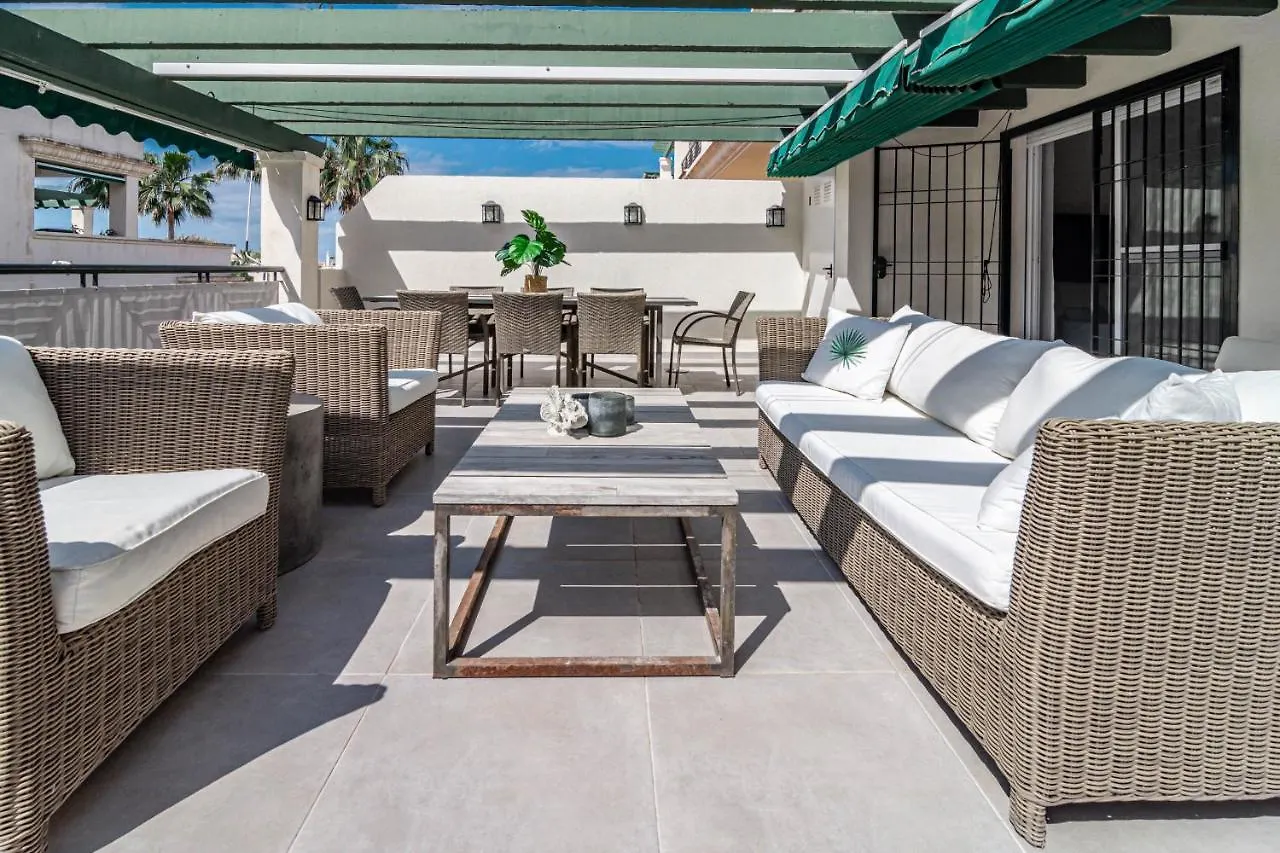 Sensational And Exotic 3-Bedroom Retreat In Nueva Andalucia With A Palm Garden Marbella Apartment