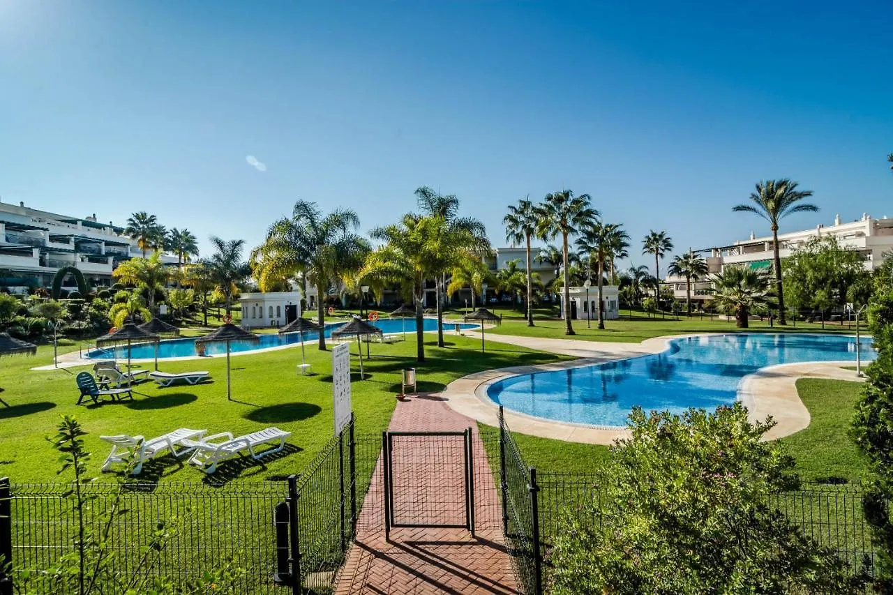 Sensational And Exotic 3-Bedroom Retreat In Nueva Andalucia With A Palm Garden Marbella Apartment